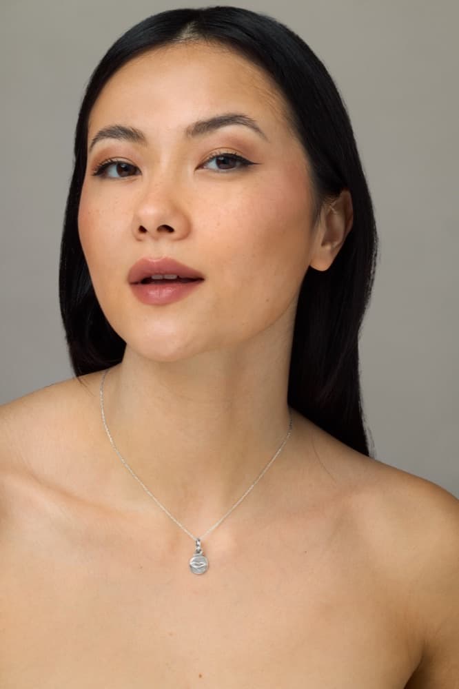 Feminine Empowerment Pendant, worn