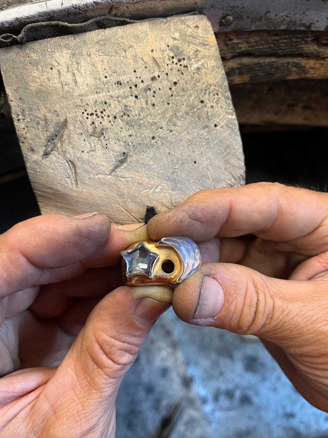 A ring held in two hands