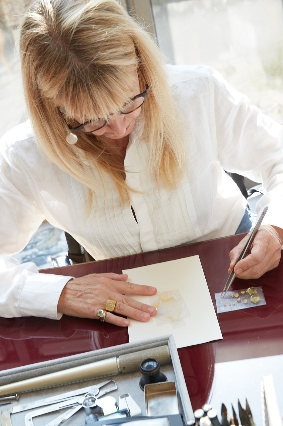 Louise drawing at her desk