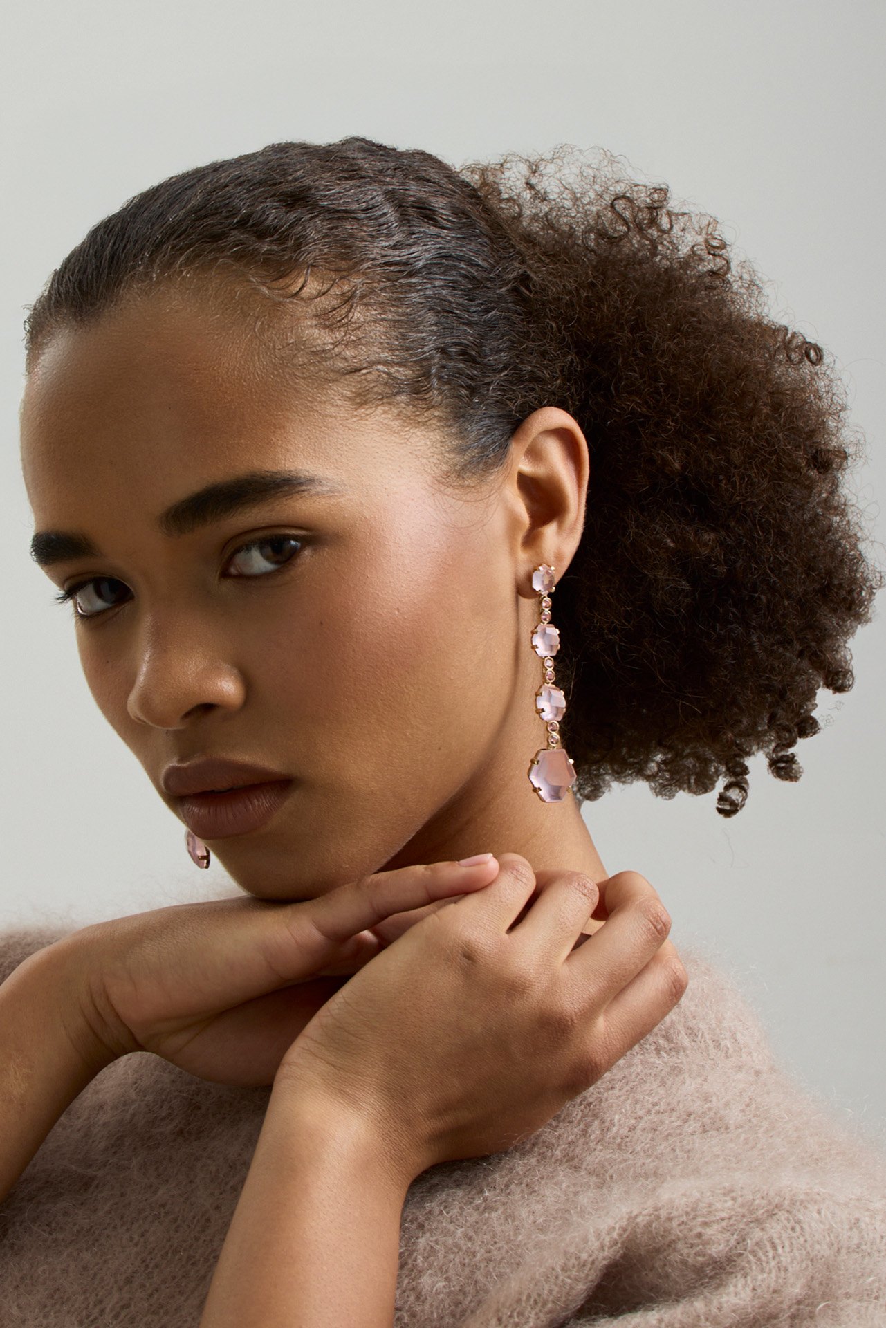 A Flintstone earring worn