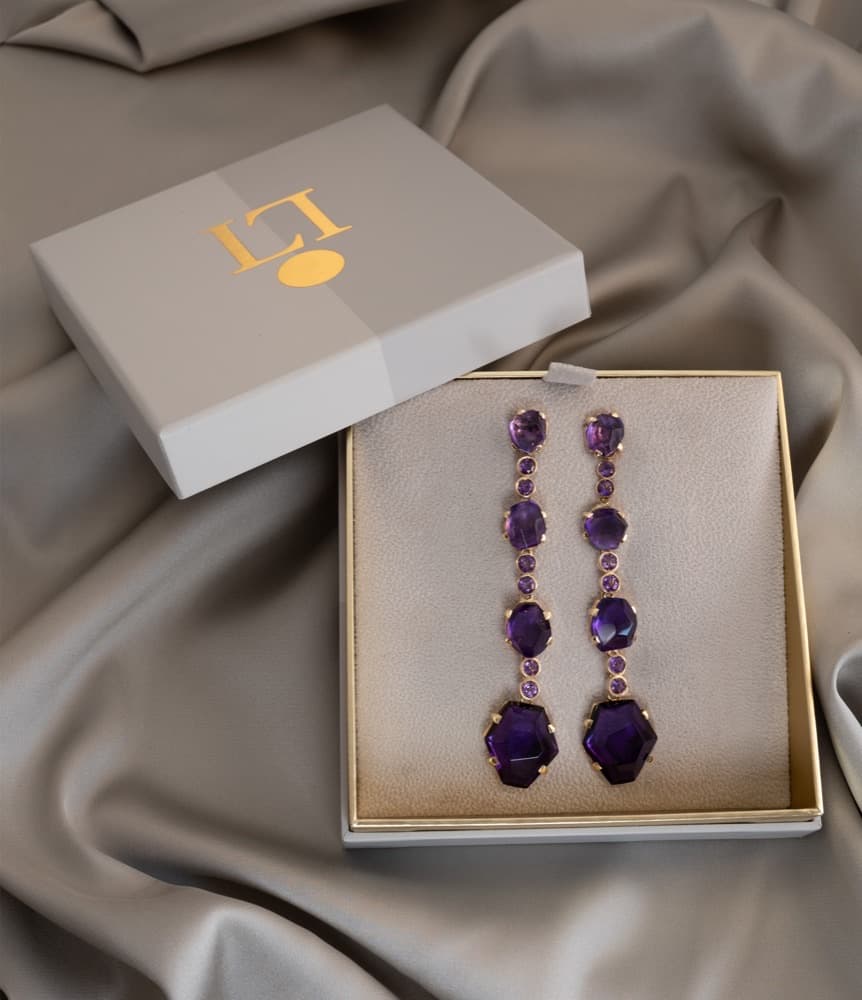 Plum Flintstone in its box